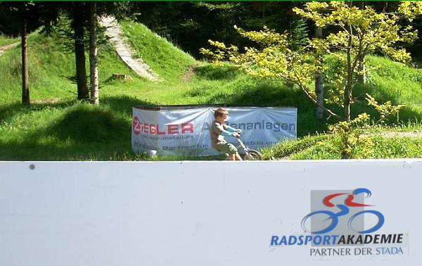 Young biker practices in the bike park
